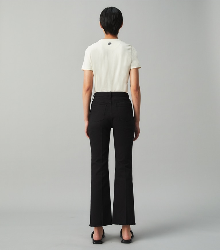 Tory Burch designer bas Jean coupe bottine dans Black sur modèle, de dos