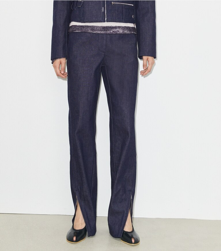 Tory Burch diseñador prendas de abajo Jean de algodón con cremallera en el tobillo en Raw/Unwashed detalle en modelo