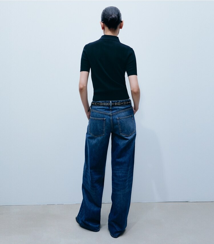 Tory Burch diseñador prendas inferiores Jean de pierna ancha en Dark Vintage Wash parte posterior en modelo