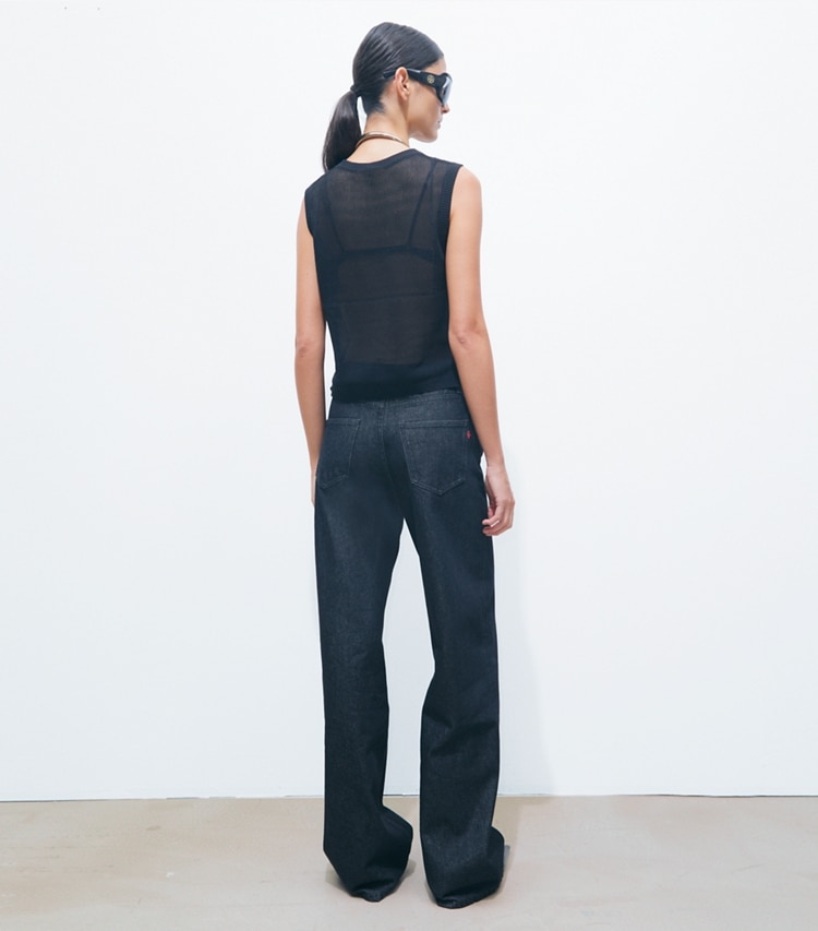 Tory Burch designer bas Jean droit in Rinse Wash on model back