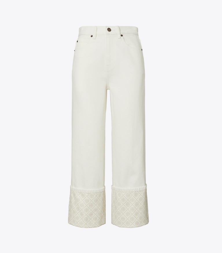 Tory Burch designer pantaloni Jeans a gamba dritta con risvolto a contrasto con T Monogram in White front