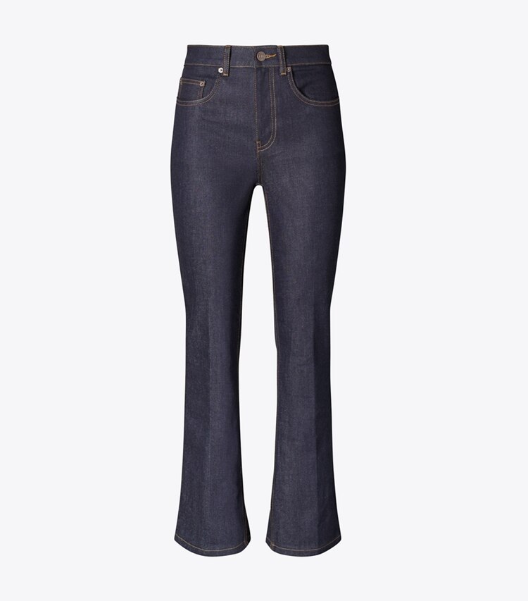 Tory Burch diseñador prendas inferiores Jeans acampanados recortados en Raw/Unwashed frente