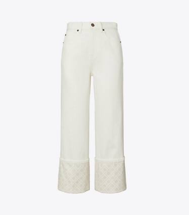Tory Burch designer unterteile Jeans mit T-Monogramm, kontrastierendem Umschlag und geradem Beinschnitt in White front
