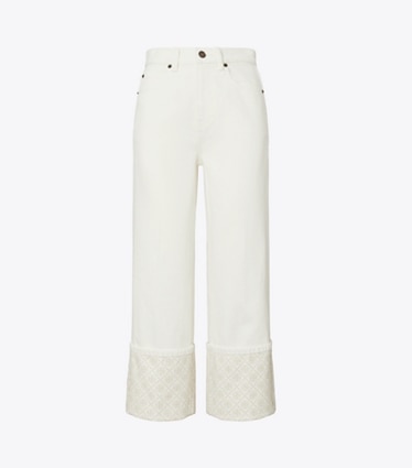 Tory Burch diseñador prendas inferiores Jeans recortados con puño en contraste con monograma en T en White frente