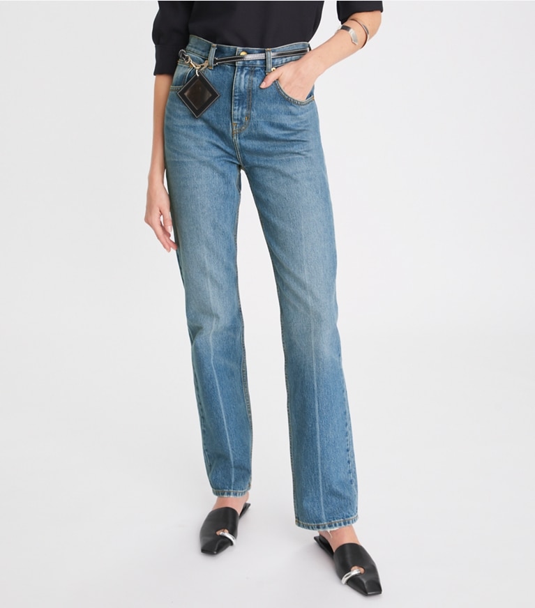 Tory Burch designer pantaloni Jeans slim a vita media con gamba dritta in Light Crease Wash front