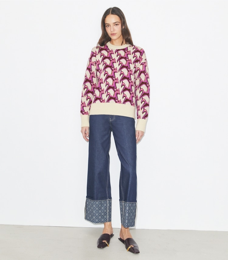Tory Burch diseñador suéteres Jersey de cuello redondo de jacquard de lana en Cream / Magenta en el modelo (frente)