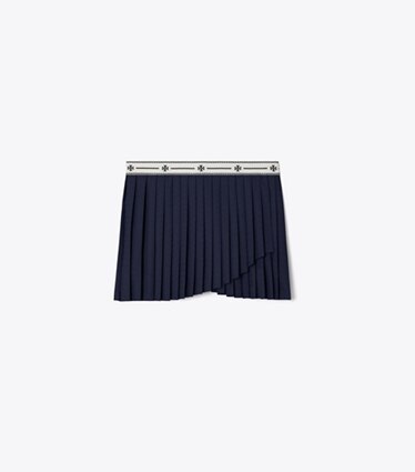 Tory Sport designer bas Jupe à superposition en jersey performance Jacquard à pinces dans Tory Navy de face