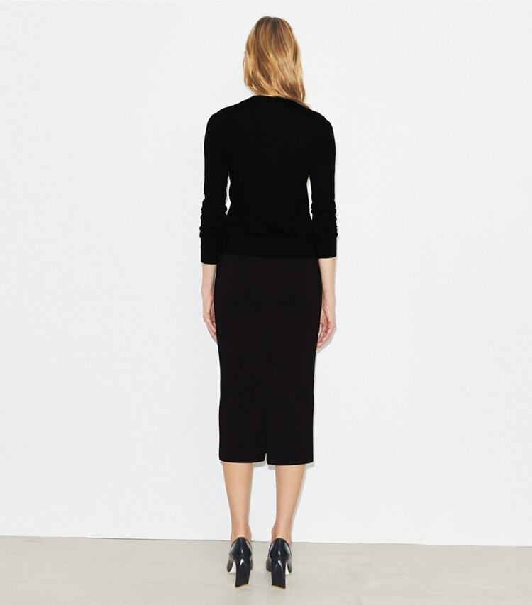 Tory Burch designer bas Jupe crayon à compression dans Black sur modèle, de dos