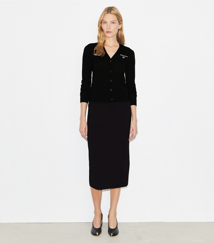 Tory Burch designer bas Jupe crayon à compression dans Black sur modèle, de face