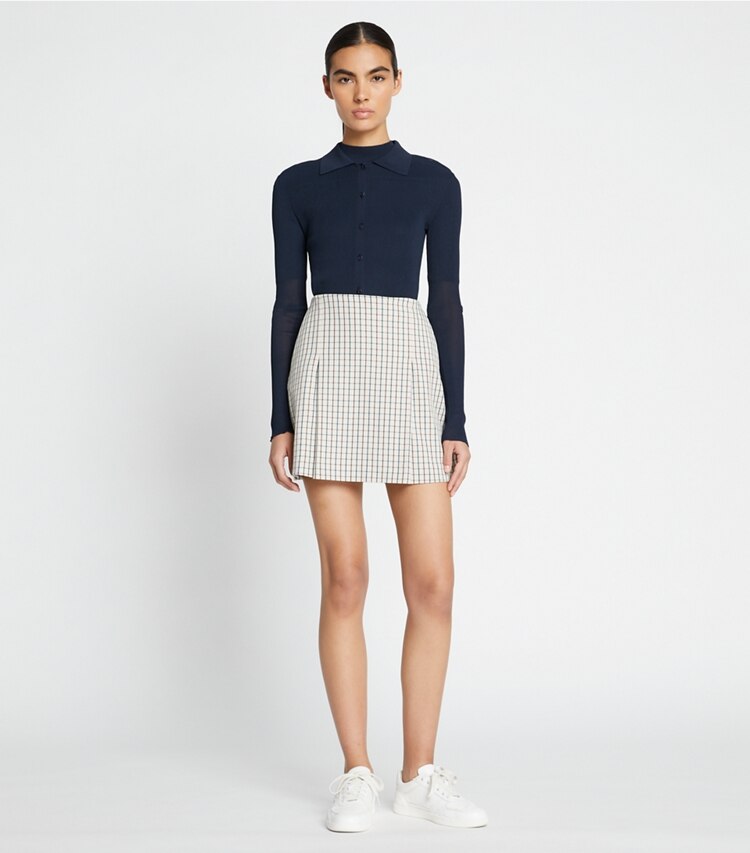Tory Sport designer bas Jupe de golf en sergé, devant à pinces dans Sesame Mini Plaid sur modèle, de face