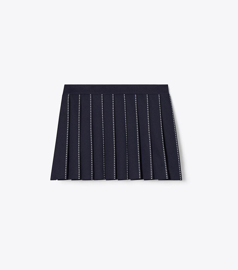 Tory Burch designer bas Jupe de tennis brodée d’un X dans Deep Navy de face