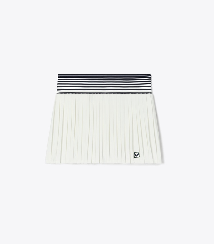 Tory Sport designer bas Jupe de tennis en jersey performance dans Snow White / Tory Navy de face
