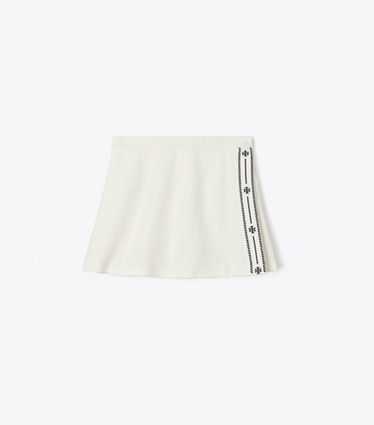 Tory Burch designer bas Jupe de tennis en maille sergé in Snow White / Tory Navy front