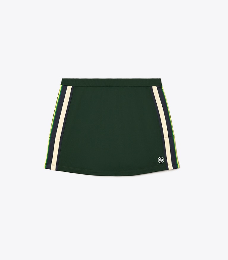 Tory Sport designer bas Jupe de tennis en piqué technique dans Conifer de face