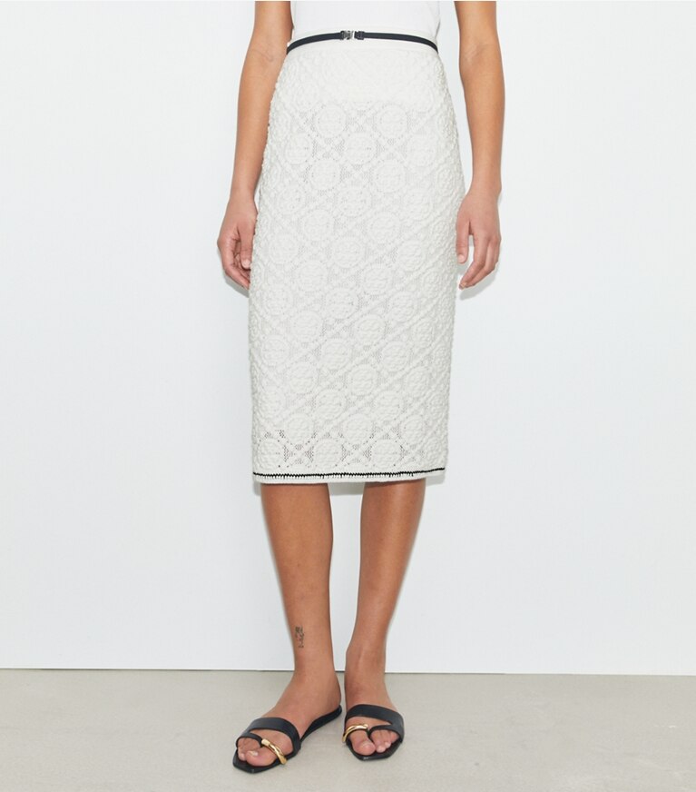 Tory Burch designer bas Jupe en dentelle de coton à logo dans White détail sur modèle