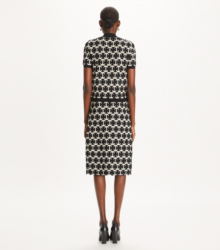 Tory Burch designer bas Jupe en tissu bouclé motif logo in BLACK / FRENCH CREAM front