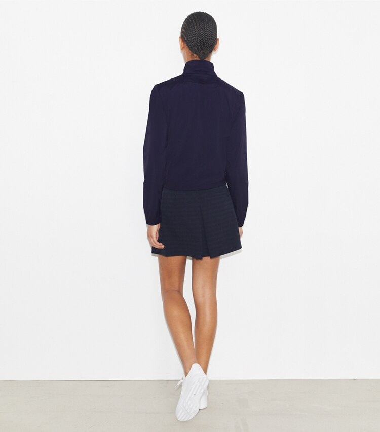 Tory Burch designer bas Jupe jacquard Sublime dans Deep Navy sur modèle, de dos