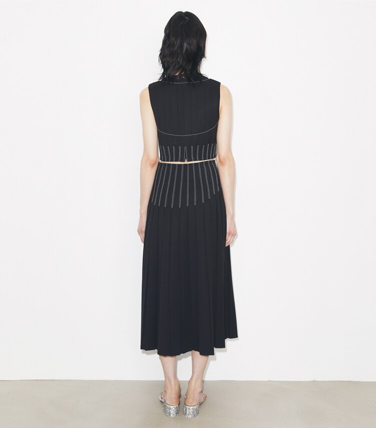 Tory Burch designer bas Jupe plissée en sergé de laine in Black on model back
