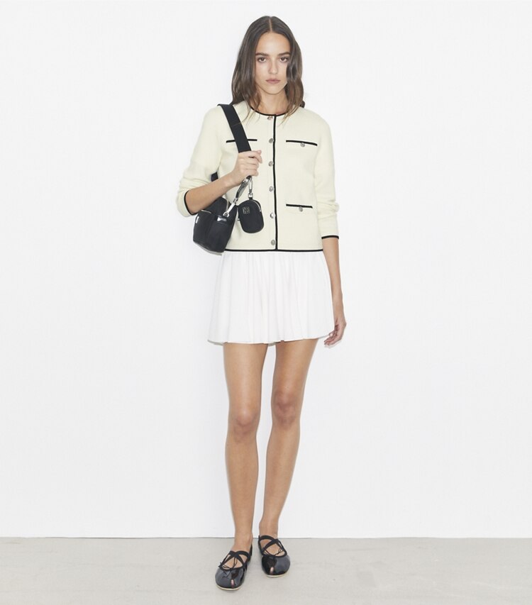 Tory Burch designer strickware Kendra Cardigan aus Wolle in NEW IVORY/ BLACK modell von vorn