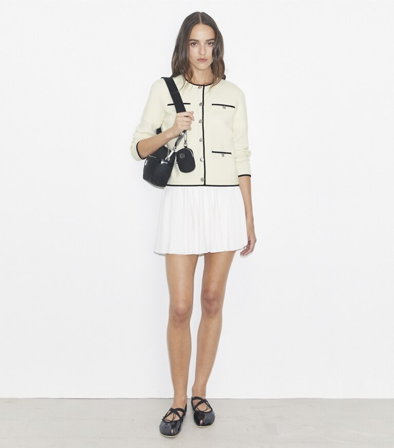Tory Burch designer strickware Kendra Cardigan aus Wolle in NEW IVORY/ BLACK front