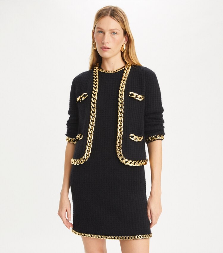 Tory Burch designer strickware Kendra Cardigan mit Kettenverzierung in Black on model detail