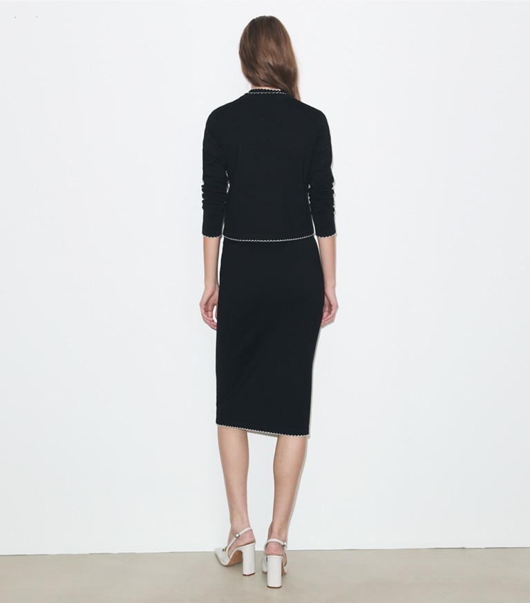 Tory Burch designer セーター ケンドラ ウール スカラップ カーディガン in Black / New Ivory on model back