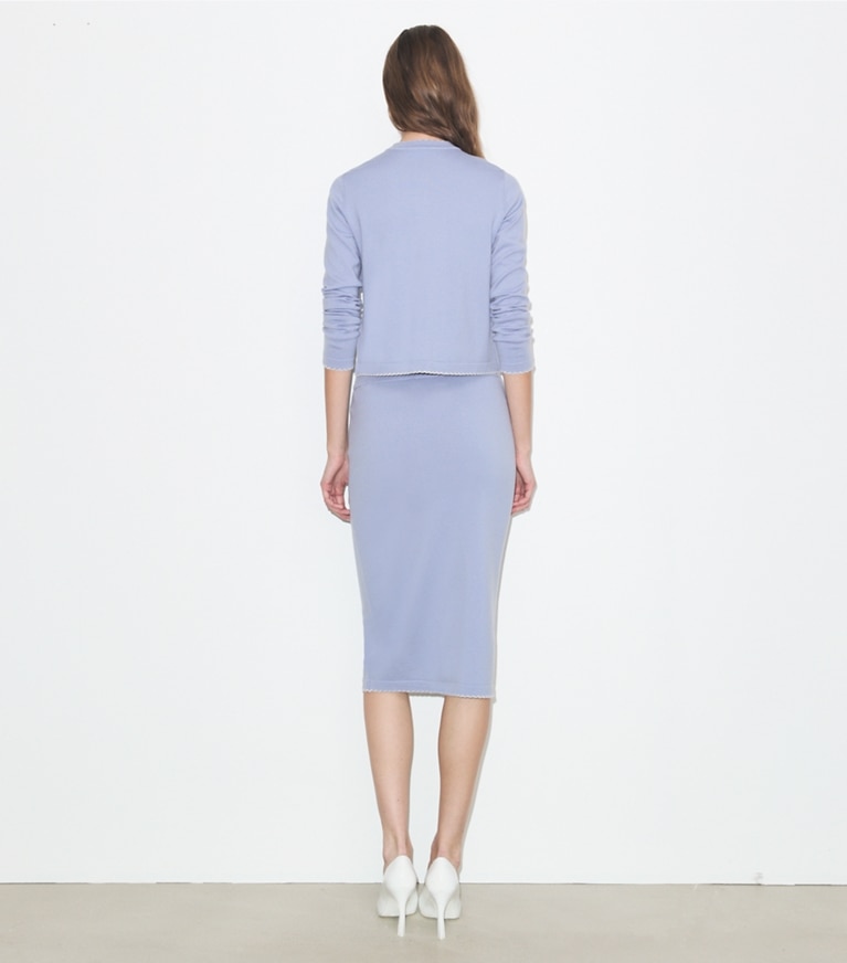 Tory Burch designer sweaters Kendra Wool Scalloped Cardigan in Pale Blue / New Ivory on model back