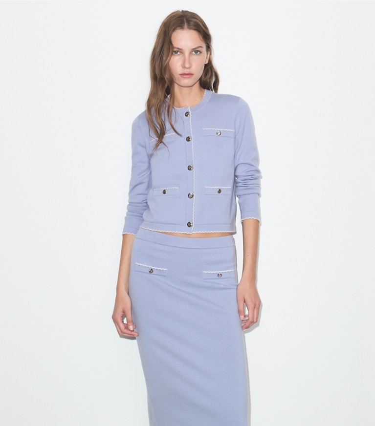 Tory Burch designer sweaters Kendra Wool Scalloped Cardigan in Pale Blue / New Ivory on model detail