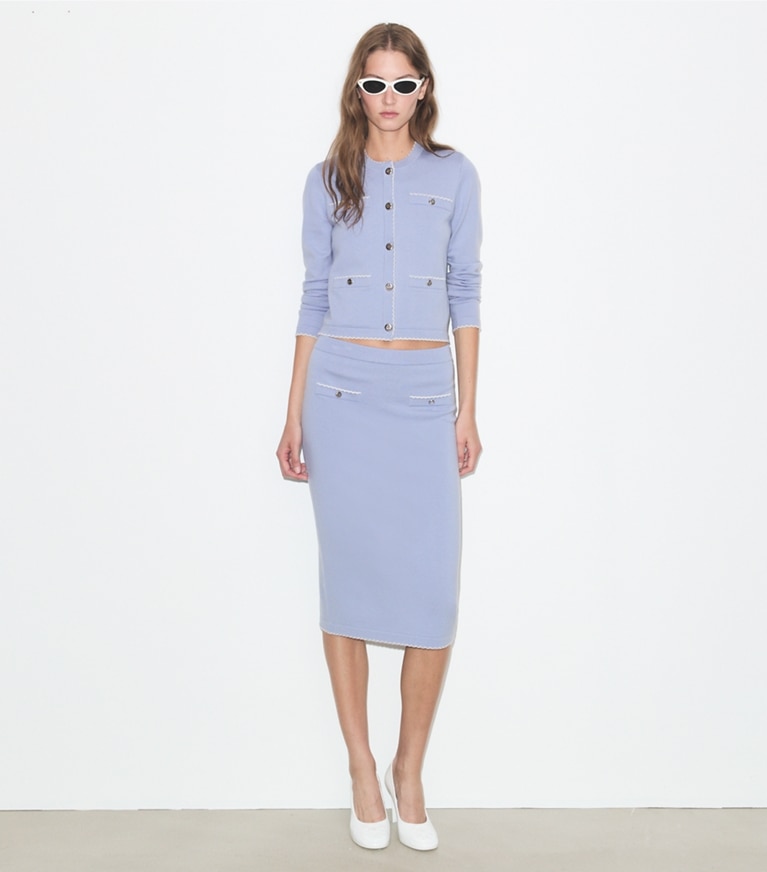 Tory Burch designer sweaters Kendra Wool Scalloped Cardigan in Pale Blue / New Ivory on model front