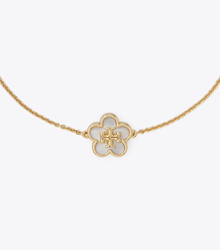 Tory Burch designer armbänder Kira Blumenarmband in Tory Gold / Mother of Pearl detail