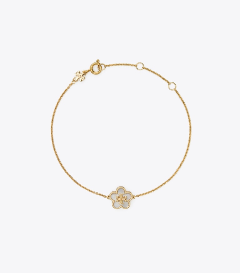 Tory Burch designer armbänder Kira Blumenarmband in Tory Gold / Mother of Pearl front