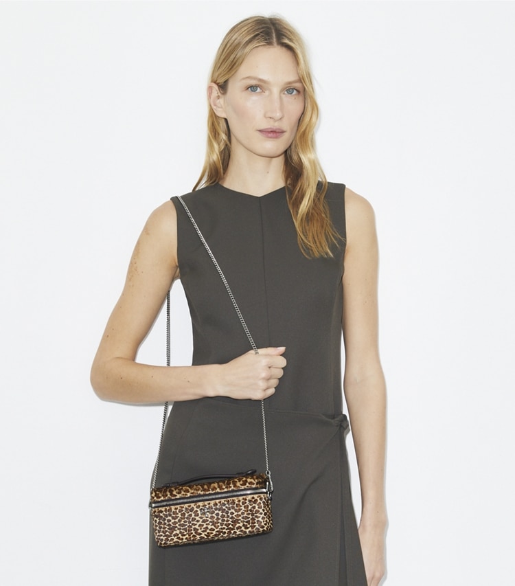 Tory Burch designer mini bags Kira Calf Hair Vanity Case in Multi accessory on model