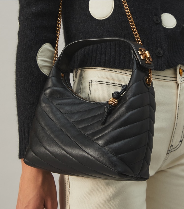 Tory Burch designer shoulder bags Kira Chevron Crescent Bag in Black / Rolled Gold additional on model