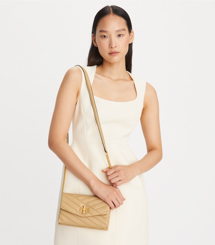 Tory Burch designer mini bags Kira Chevron Crossbody in Desert Dune accessory on model