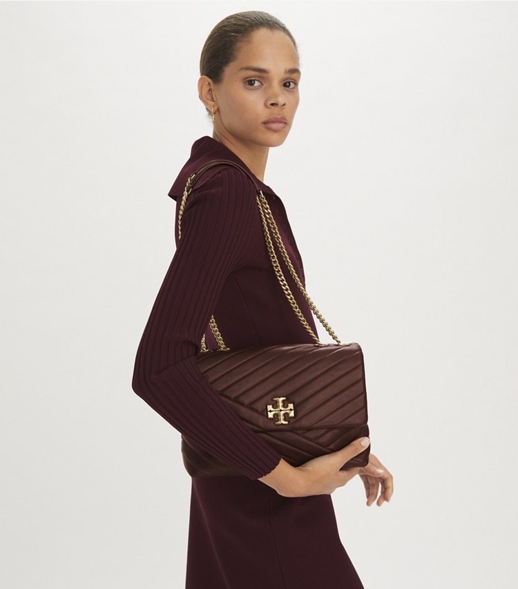 Tory Burch designer shoulder bags Kira Chevron Shoulder Bag in TEMPRANILLO accessory on model