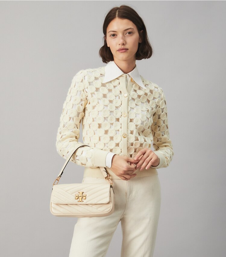 Tory Burch designer shoulder bags Kira Chevron Small Flap Shoulder Bag in New Cream accessory on model