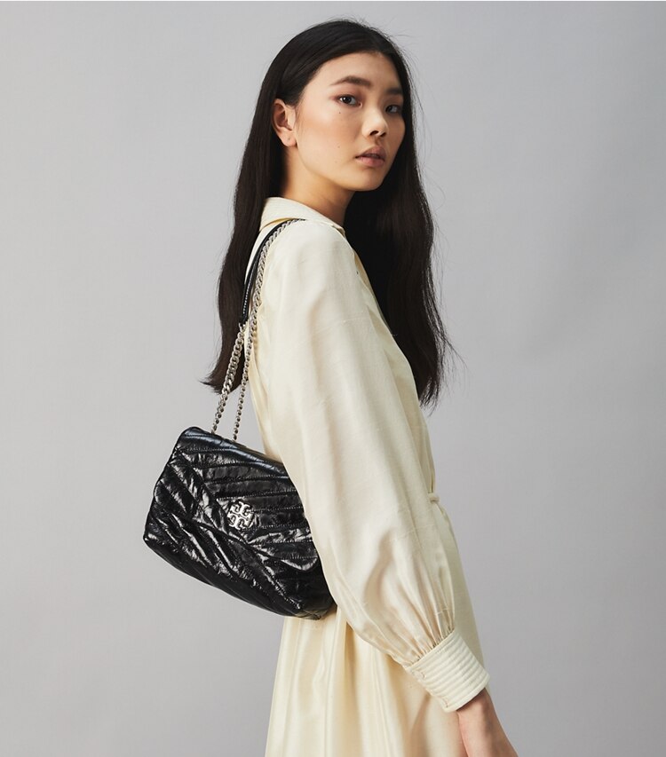 Tory Burch designer shoulder bags Kira Chevron Textured Small Convertible Shoulder Bag in Black accessory on model