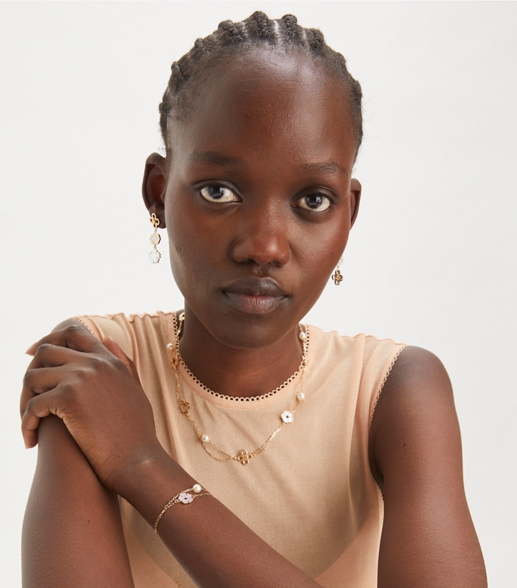 Tory Burch designer bracelets Kira Clover Bracelet in Tory Gold / Pink / Ivory accessory on model