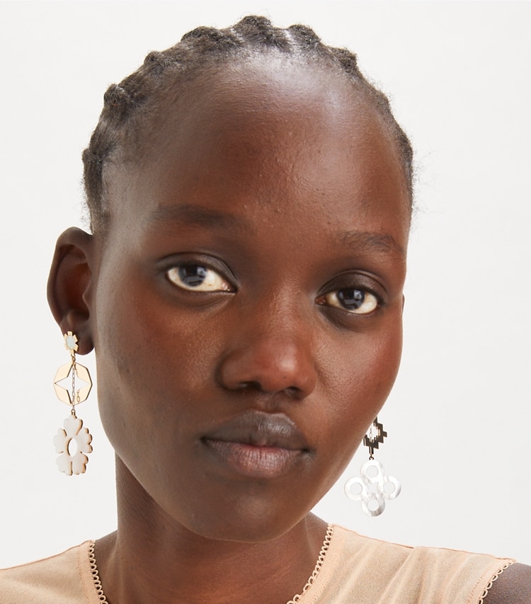 Tory Burch designer earrings Kira Clover Earring in Tory Gold / Mother of Pearl accessory on model