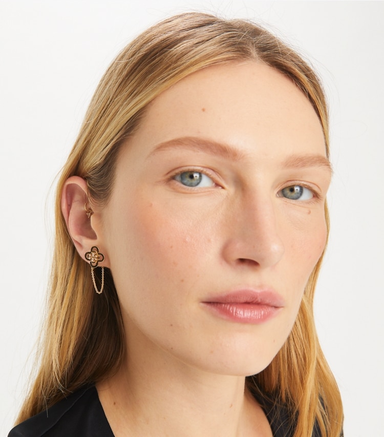Tory Burch designer earrings Kira Clover Front-Back Stud Earring in Tory Gold / Crystal accessory on model
