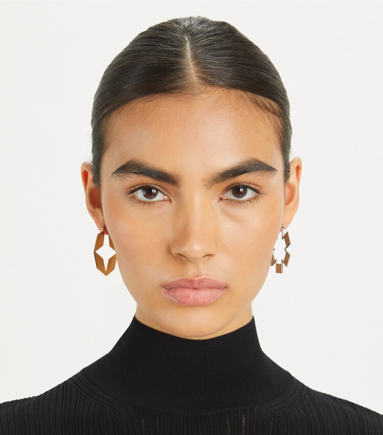 Tory Burch designer earrings Kira Clover Hoop Earring in Tory Gold / Tory Silver accessory on model