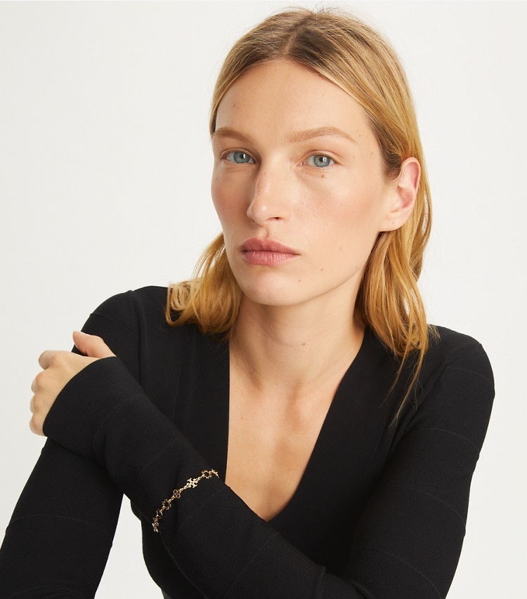 Tory Burch designer bracelets Kira Clover Multi Motif Bracelet in Tory Gold accessory on model