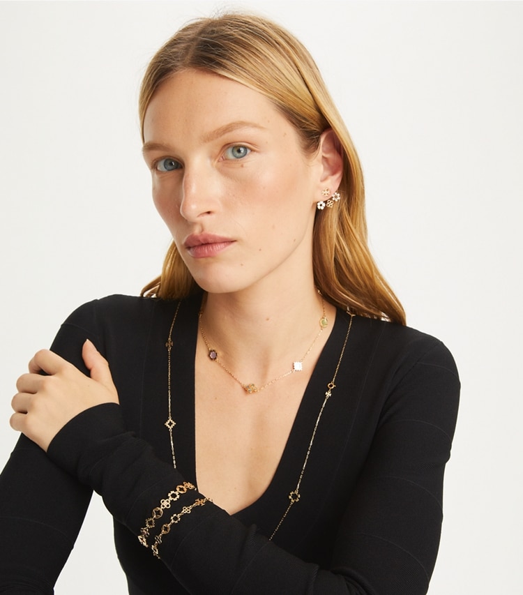 Tory Burch designer bracelets Kira Clover Multi Motif Bracelet in Tory Gold additional on model