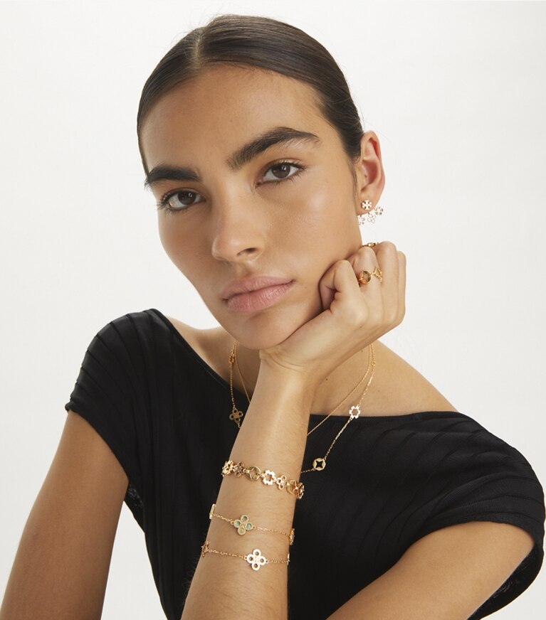 Tory Burch designer rings Kira Clover Multi Motif Ring in Tory Gold angle