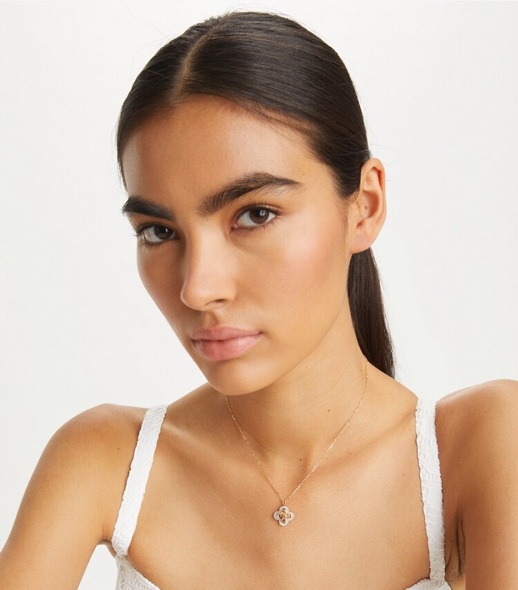 Tory Burch designer necklaces Kira Clover Pendant in Tory Gold / Mother of Pearl accessory on model