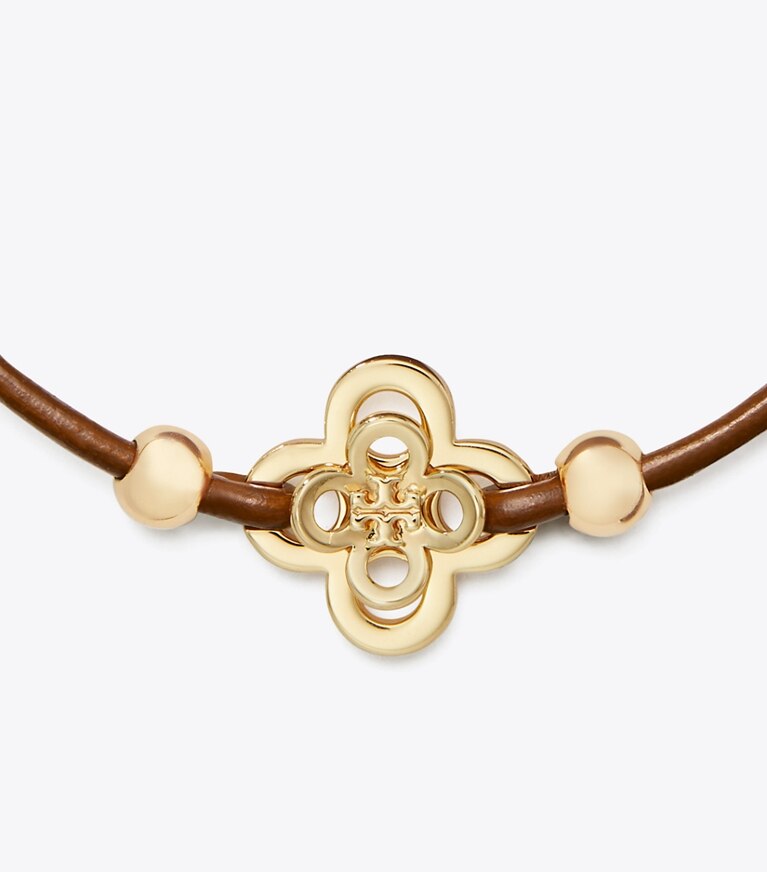 Tory Burch designer bracelets Kira Clover Slider Bracelet in Tory Gold / Cuoio front