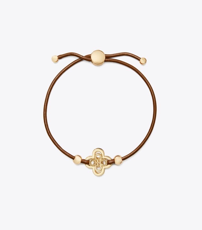 Tory Burch designer bracelets Kira Clover Slider Bracelet in Tory Gold / Cuoio front