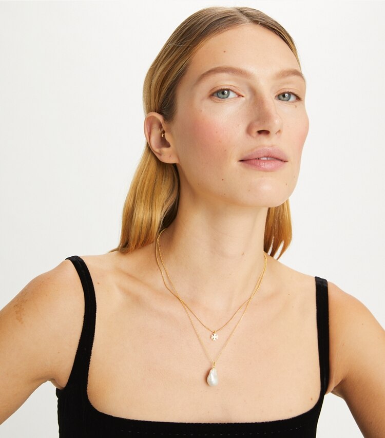 Tory Burch designer necklaces Kira Delicate Layered Necklace in Tory Gold / Cream accessory on model
