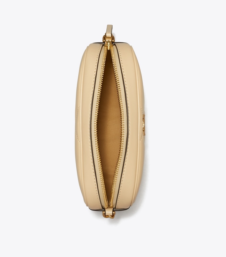 Tory Burch designer クロスボディバッグ キラ ダイヤモンドキルト カメラバッグ in Soft Serve angle