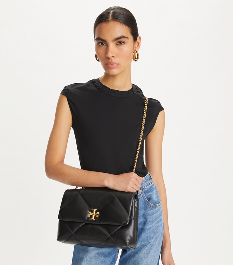 Tory Burch designer shoulder bags Kira Diamond Quilt Convertible Shoulder Bag in Black accessory on model